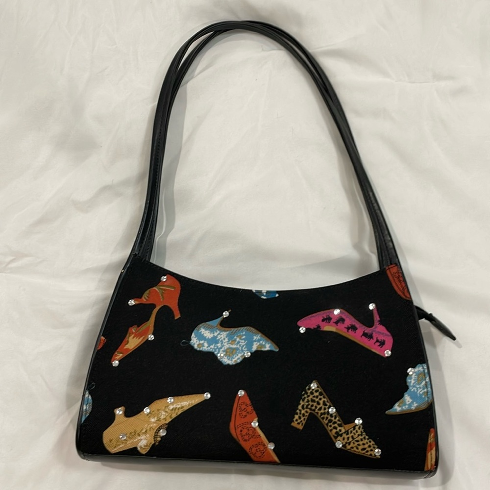 Black purse with shoe design